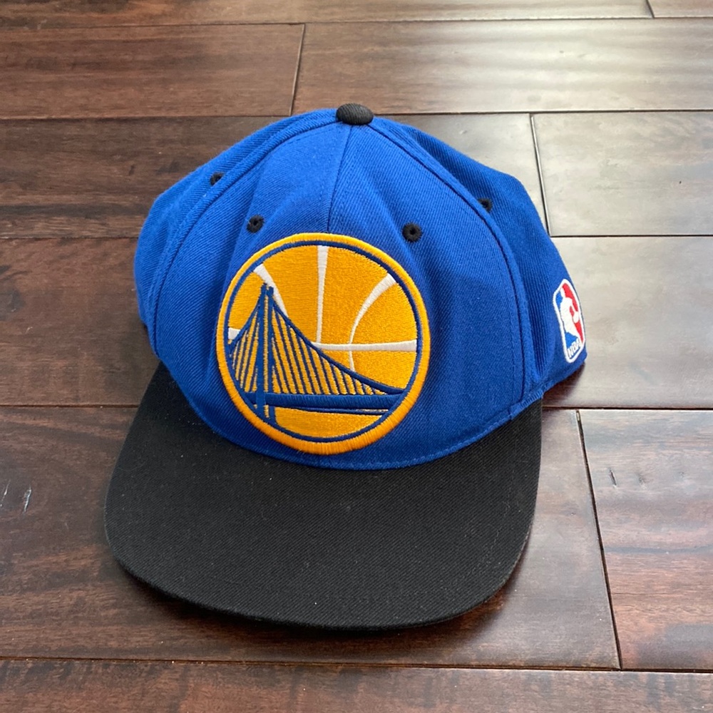 Golden State Warriors NBA hat.